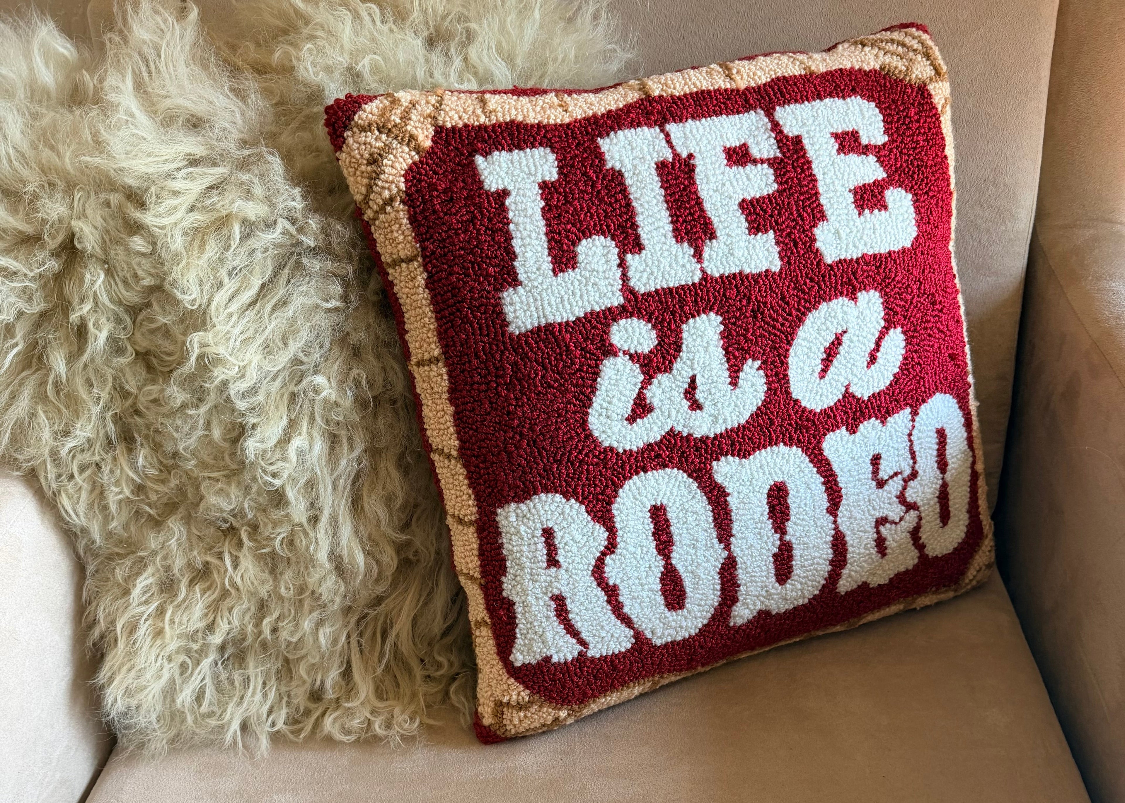 LIFE IS A RODEO HAND HOOKED PILLOW