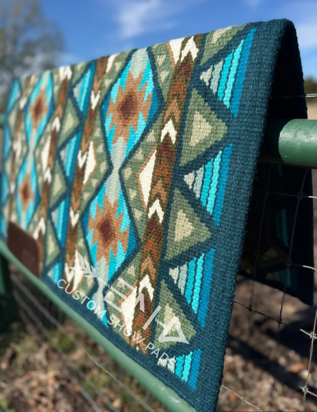 Em Custom Ranch Pads The Tough, teal, turquoise, aqua, olive, sage green, cream & buckskin tones, western ranch pad in stock lifestyle