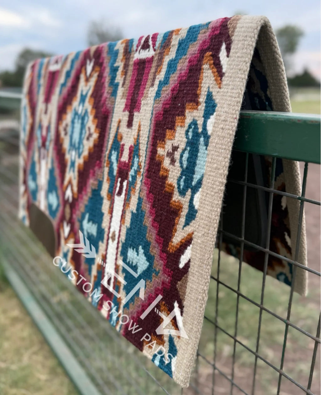 Em Custom Ranch Pads Give Me Butterflies, sand, rust, brown, taupe, cream, teal & mauve tones, western ranch pad in stock lifestyle