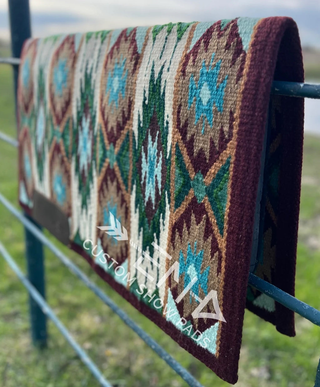 Em Custom Wilderness, burgundy, ivory, taupe, buckskin, dark hunter, moss green, chartreuse & soft turquoise tones, western ranch pad lifestyle #3