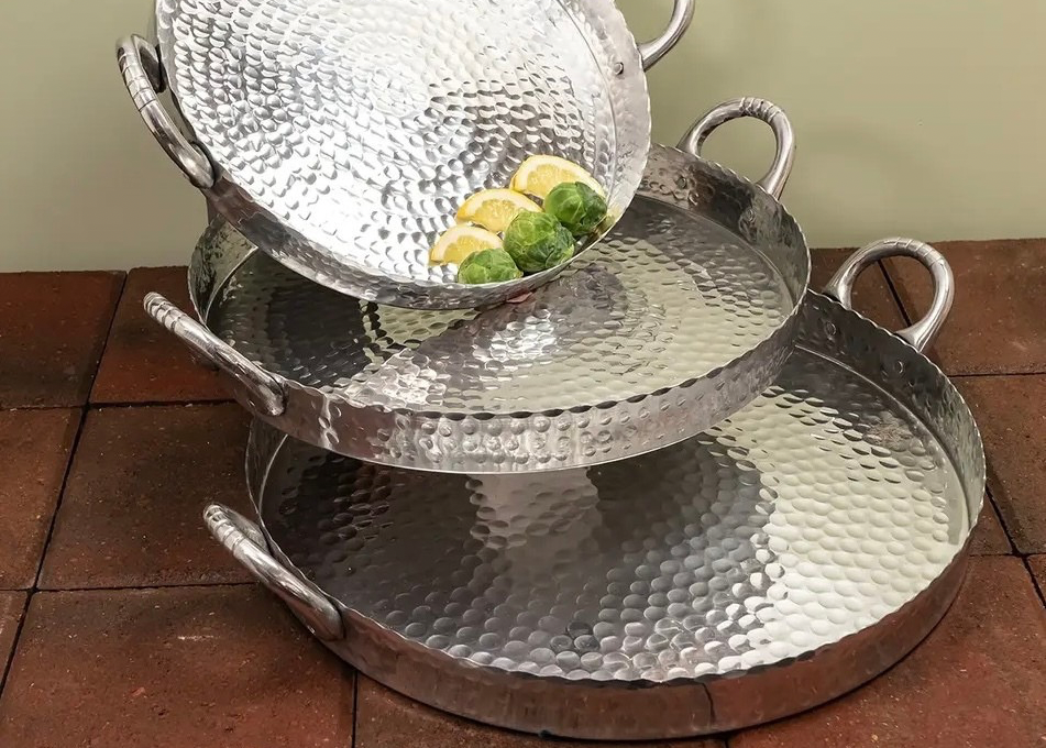 19 inch hammered aluminum tray round scalloped edge, rustic western entertaining decor in stock detail
